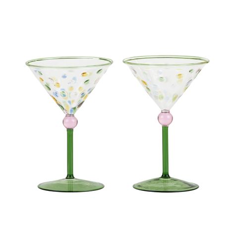 Two pink and green cocktail glasses 