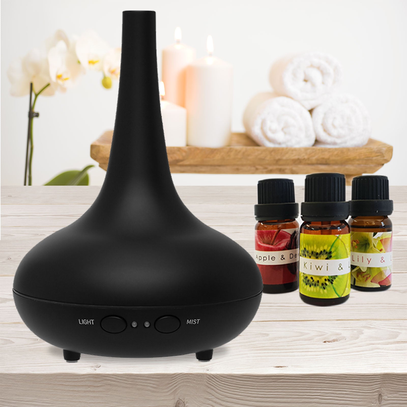 Black Essential oil diffuser and 3 essential oils 