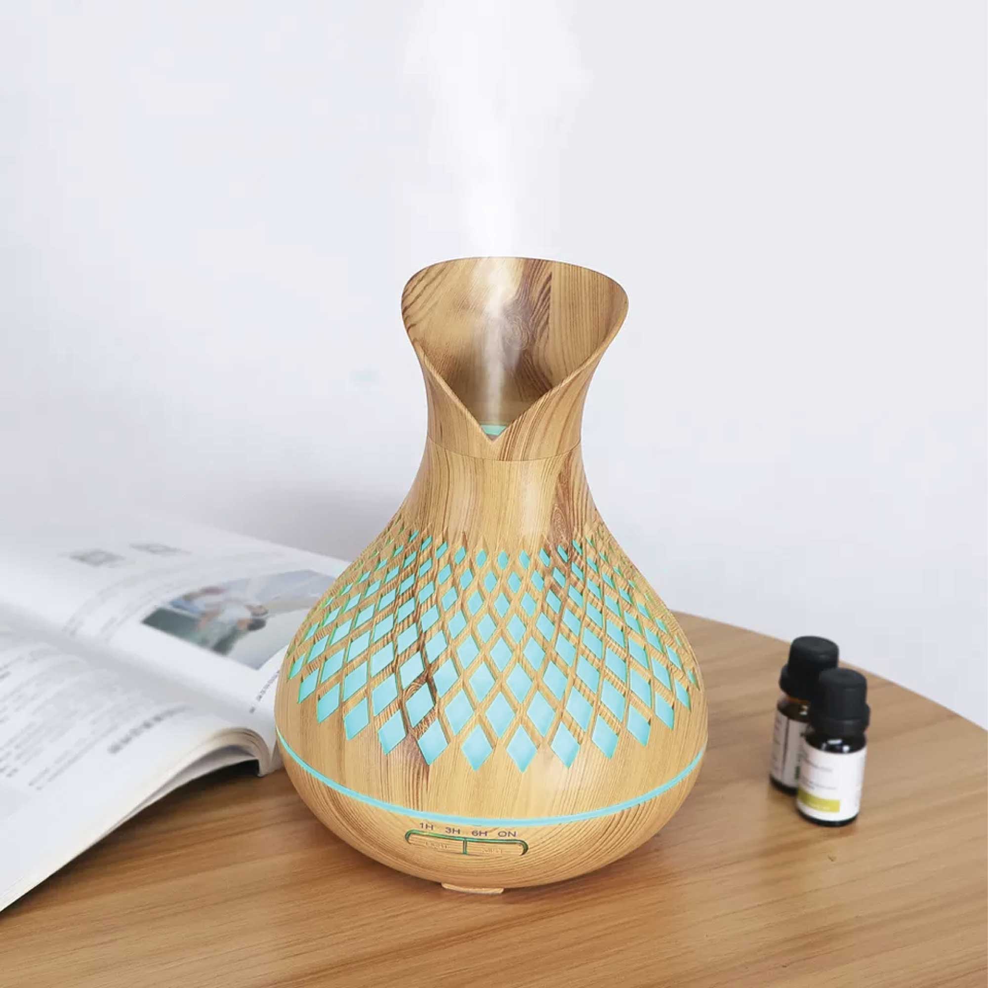 Woodgrain essential oil diffuser on table 