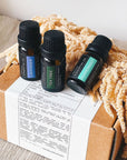 3 essentails oils on a box 